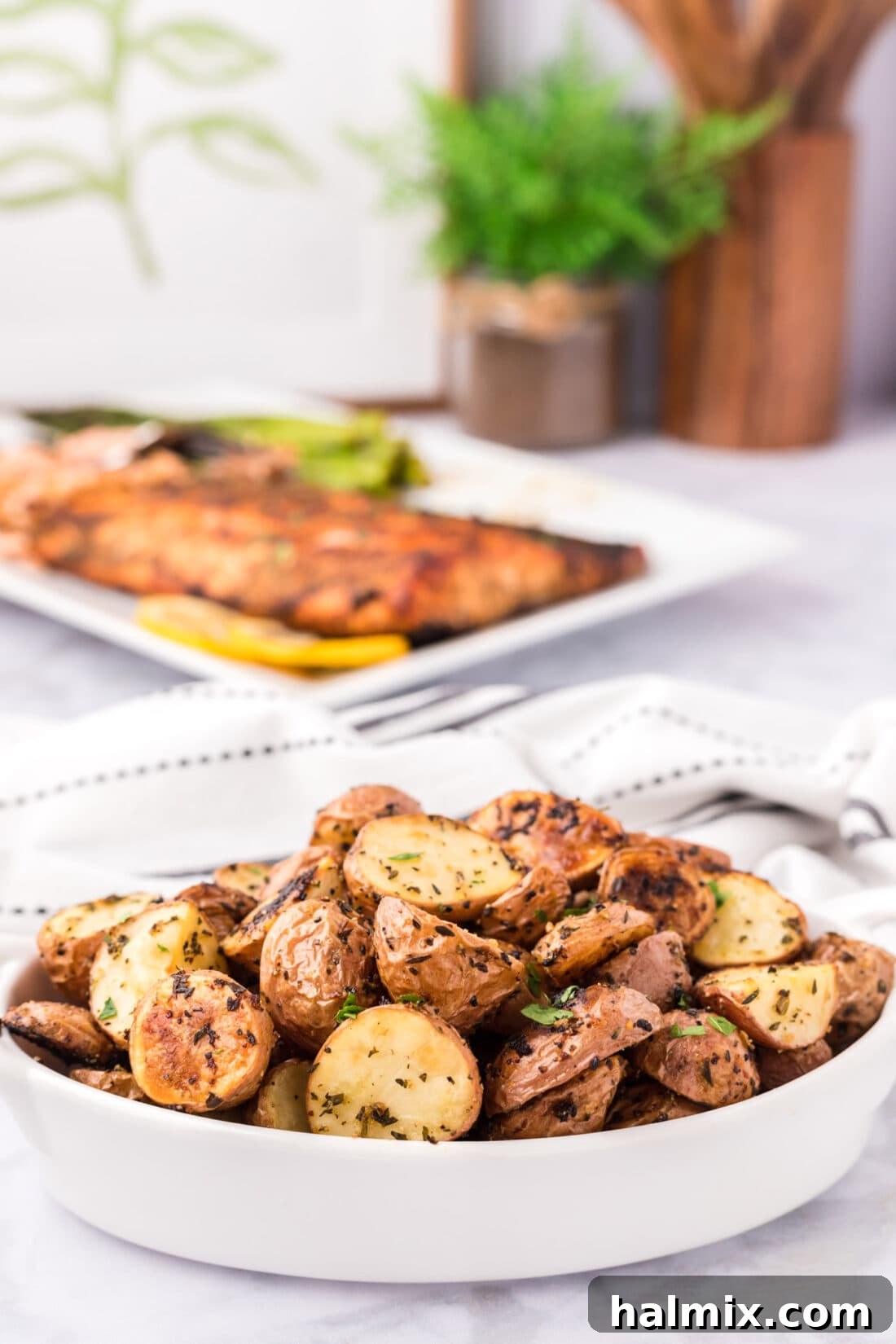 Roasted Red Potatoes in a serving dish, golden brown and crispy