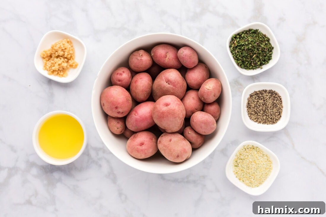 Ingredients for Roasted Red Potatoes laid out on a kitchen counter