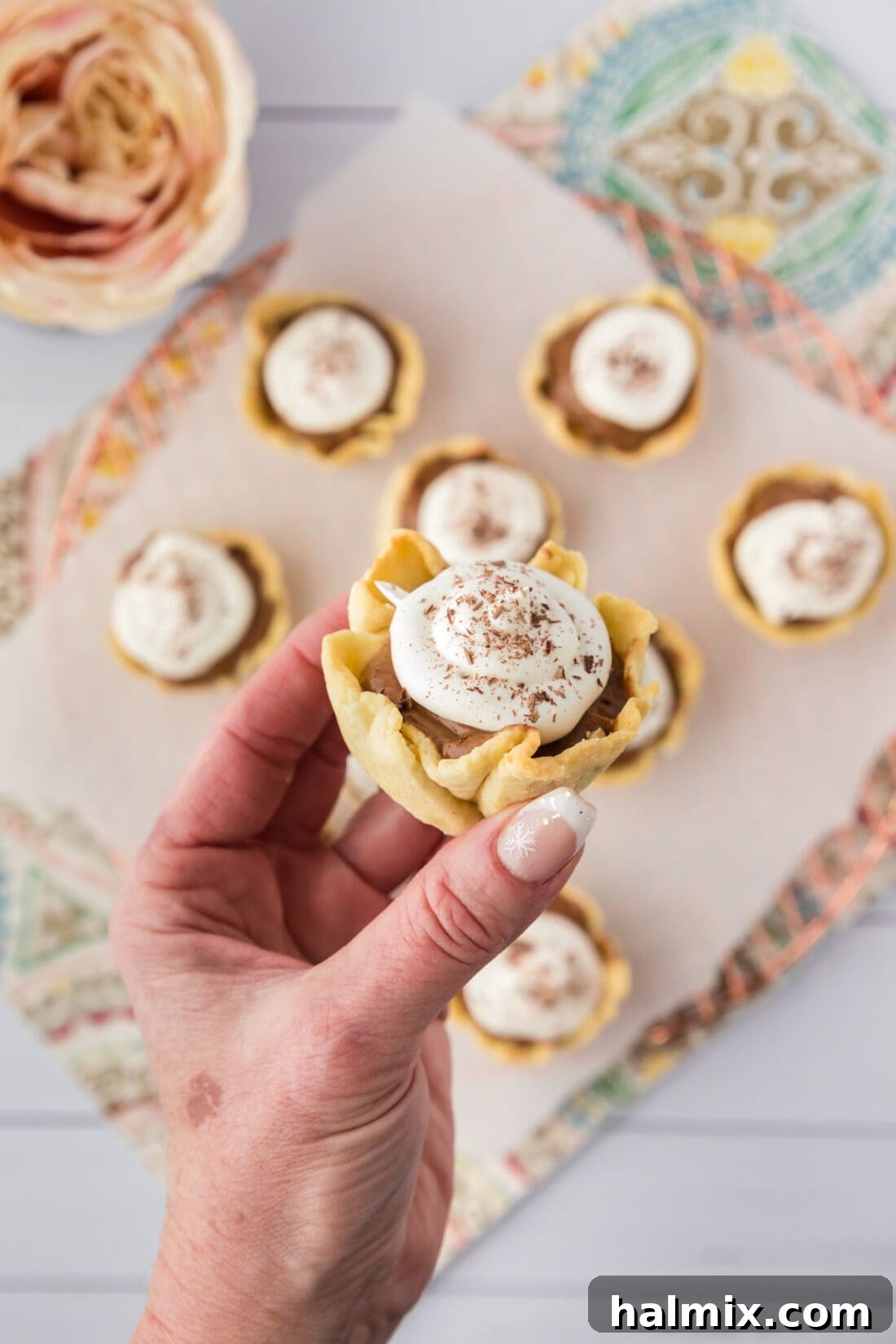 Decadent Mini French Silk Treats 2 Hand holding a Mini French Silk Pie