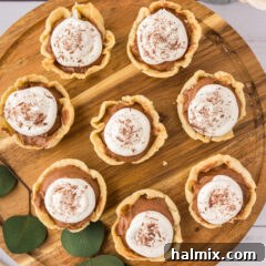 Mini French Silk Pies on a wooden platter