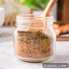 Close up photo of a jar of Cajun Seasoning
