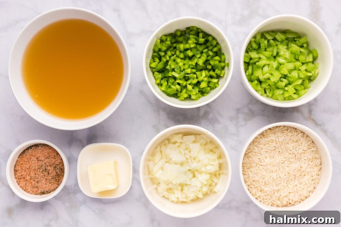 Spicy Southern Comfort Rice 4 A vibrant collection of fresh ingredients laid out for Cajun Rice preparation, including Basmati rice, fresh bell peppers, onions, celery, and a blend of spices.