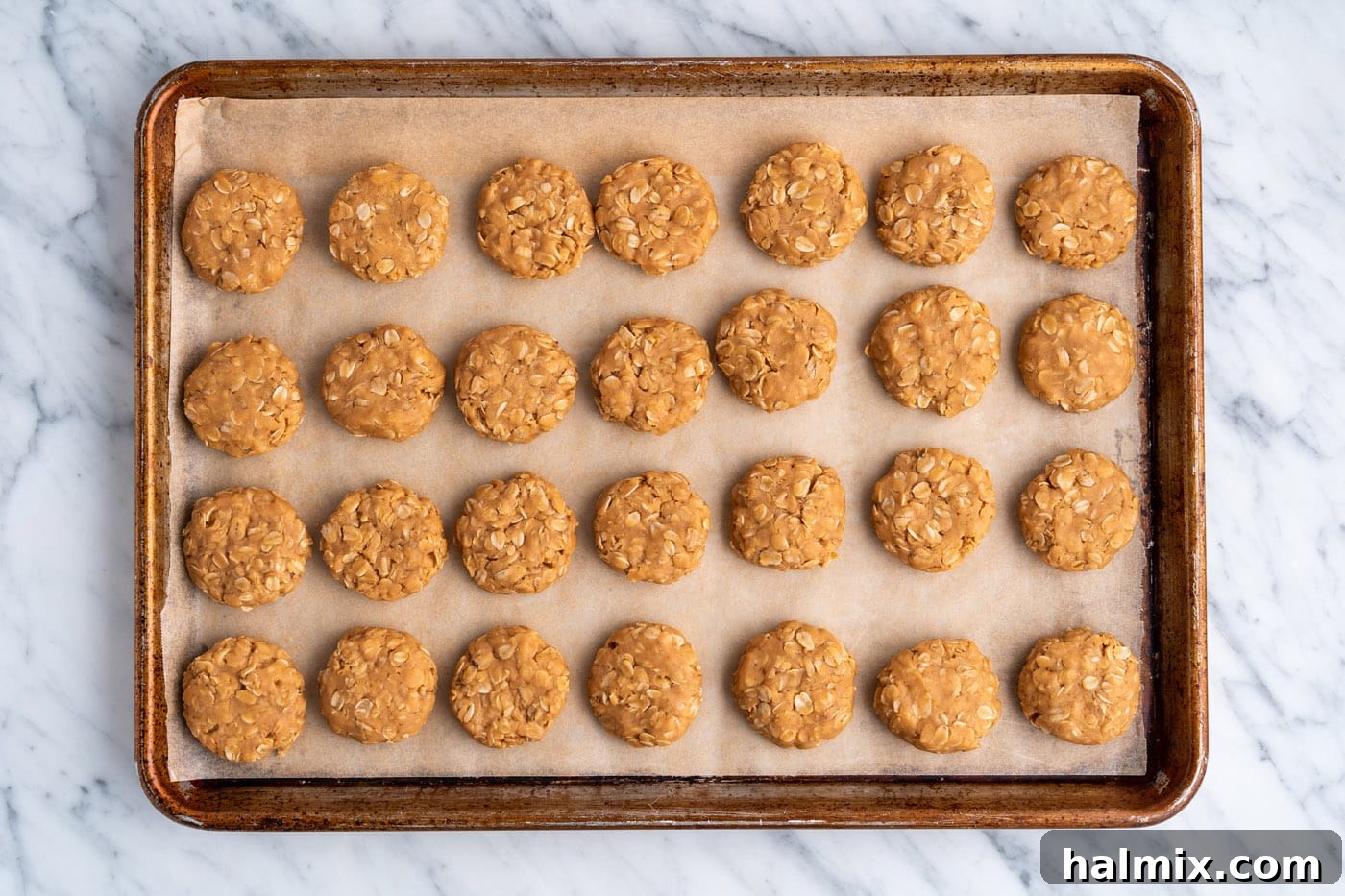 no bake peanut butter cookies on a baking sheet resting