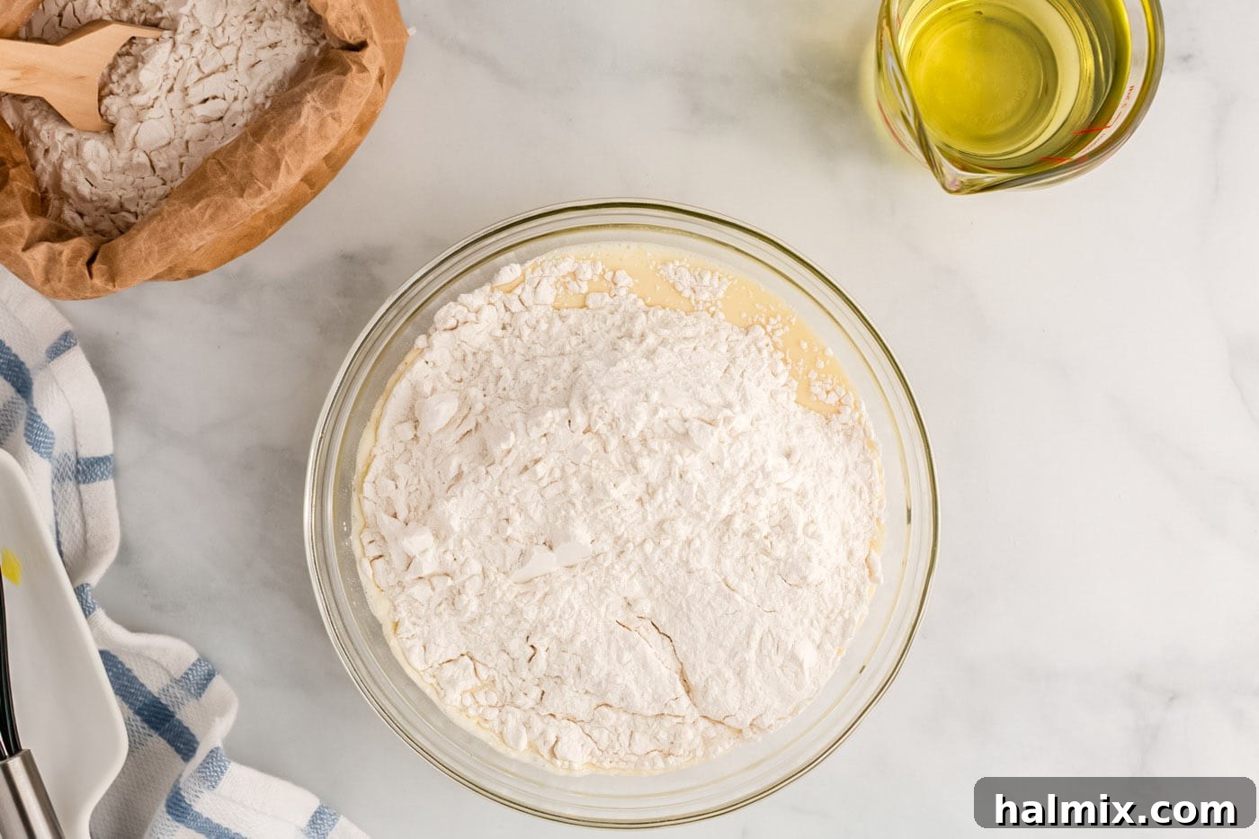 Golden Carnival Whirl 9 Adding dry ingredients to wet ingredients for funnel cake batter