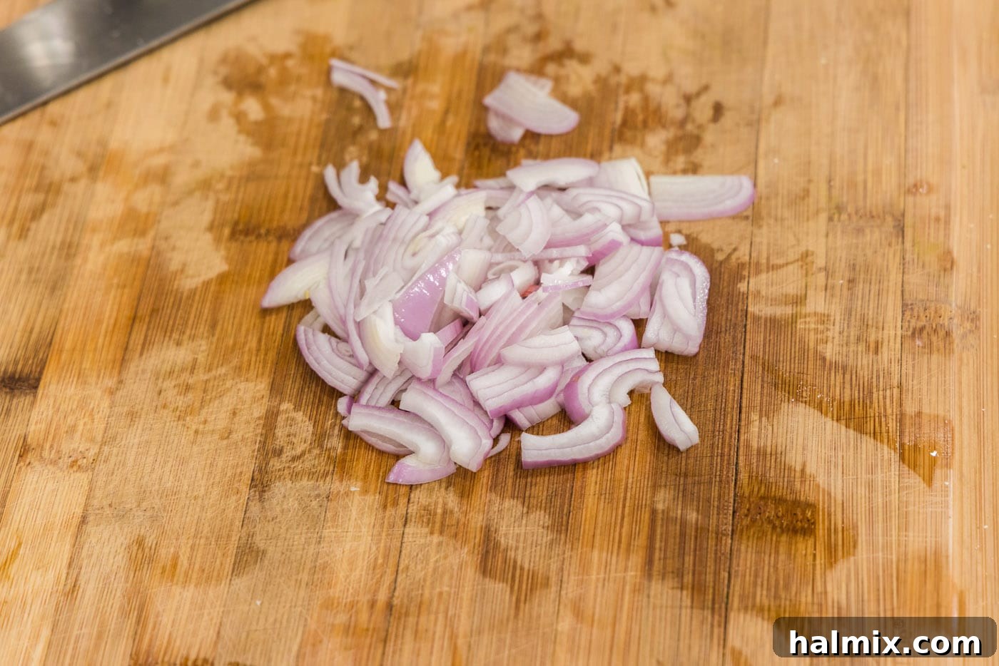 chopped shallots on a cutting board