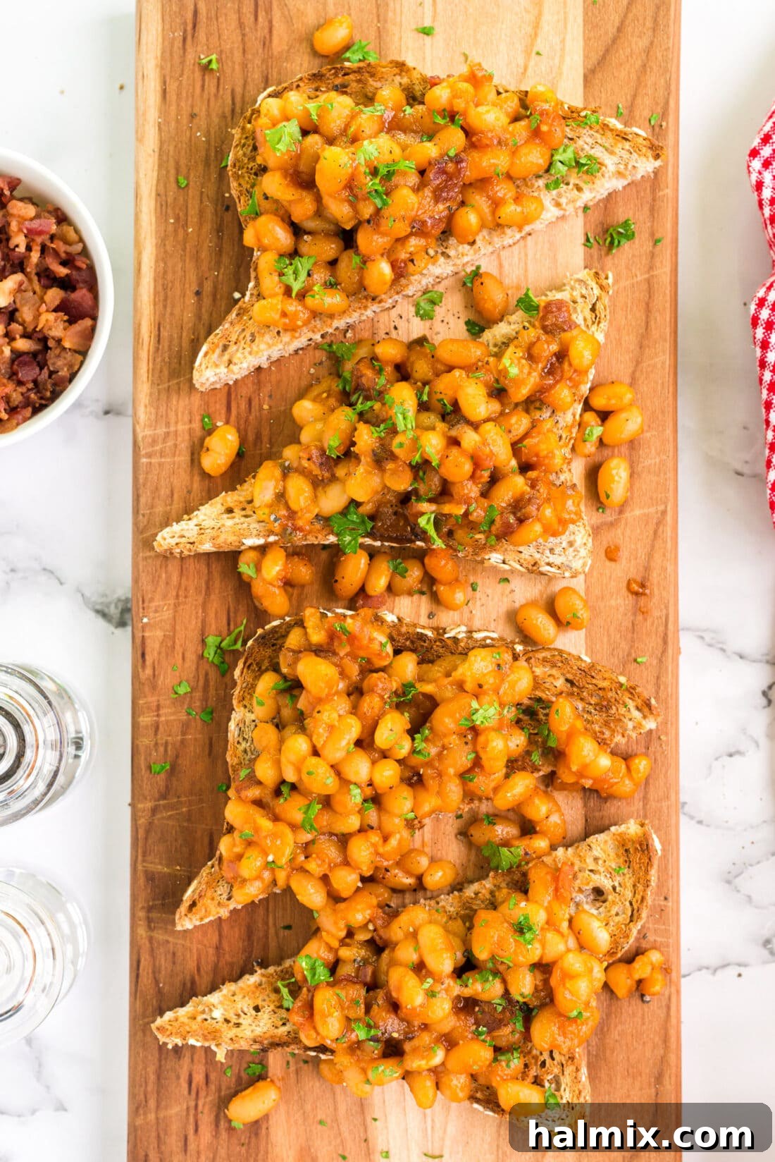 Comfort on a Slice 3 Overhead photo of Beans on Toast on a wooden serving platter