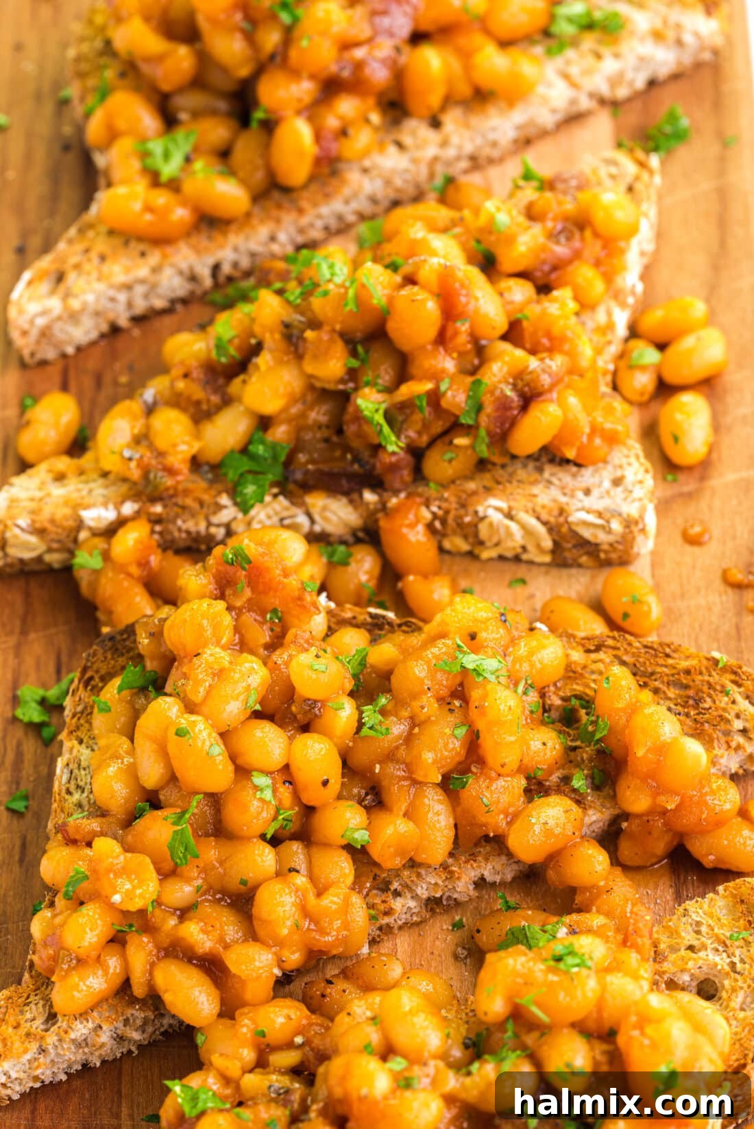 Comfort on a Slice 4 Close up photo of Beans on Toast on a wooden platter
