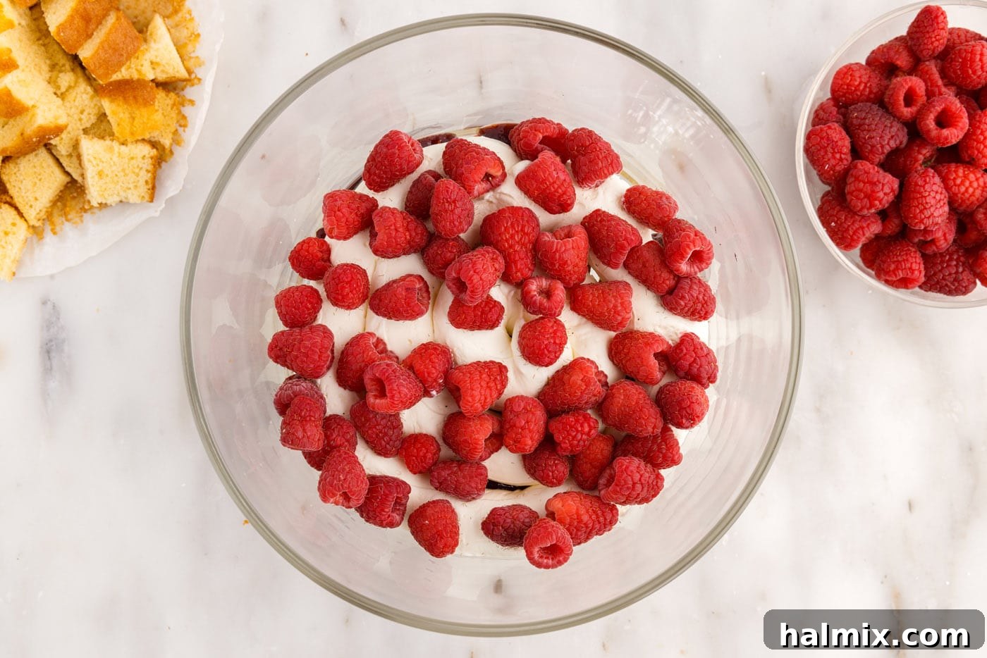 fresh raspberries added on top of cream cheese mixture