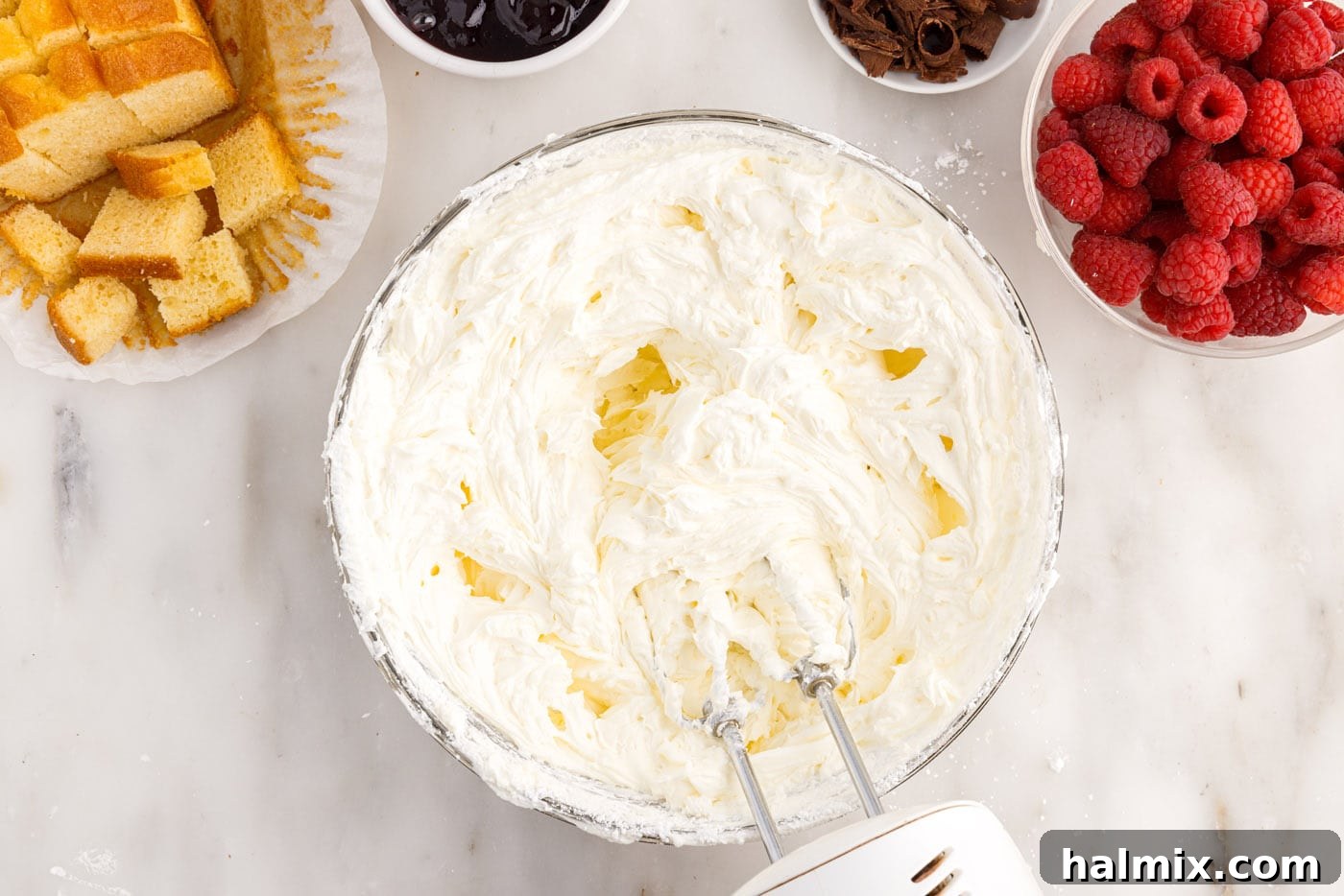 mixer incorporating whipped cream with cream cheese