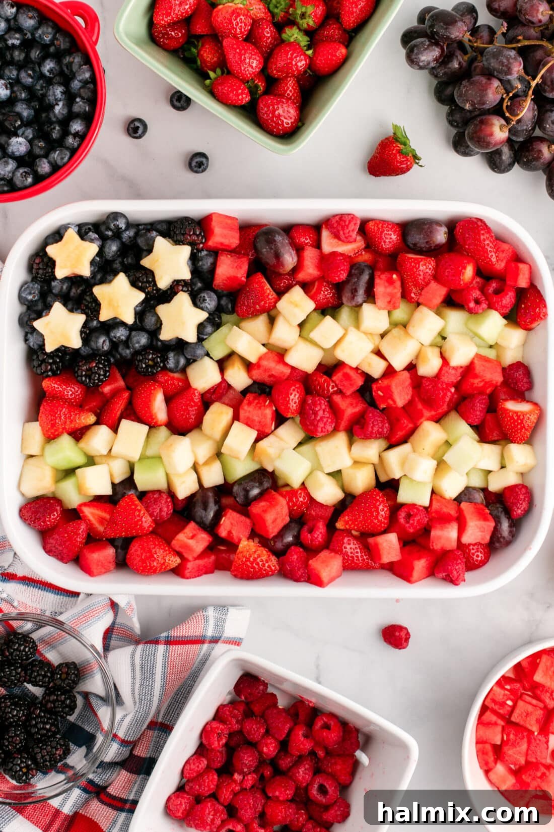 Red White & Blue Fruit Salad in a white serving dish