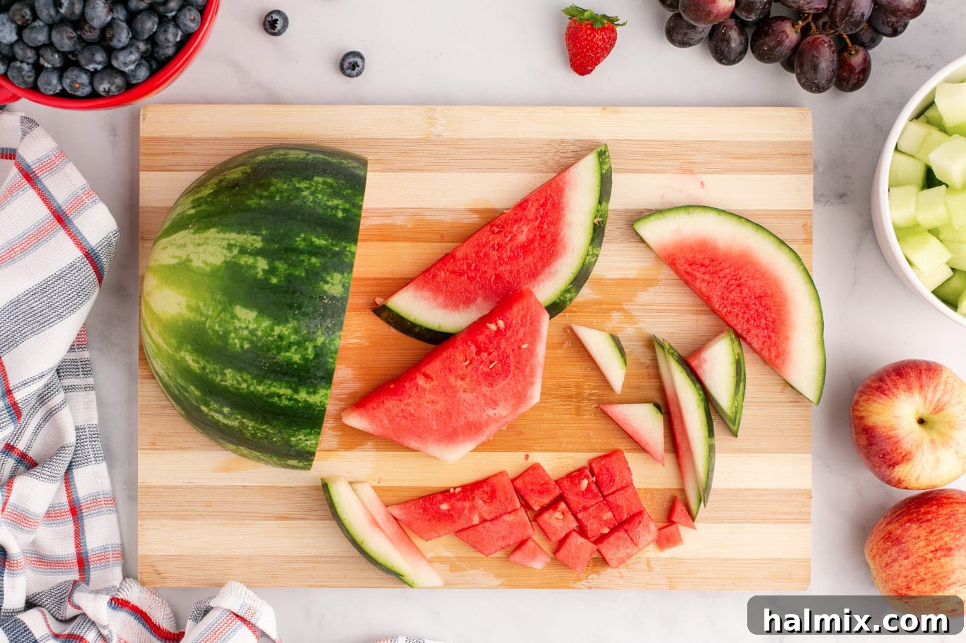 chopped watermelon on a cutting board