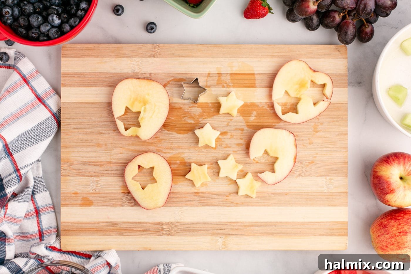 Cutting star shapes out of apples