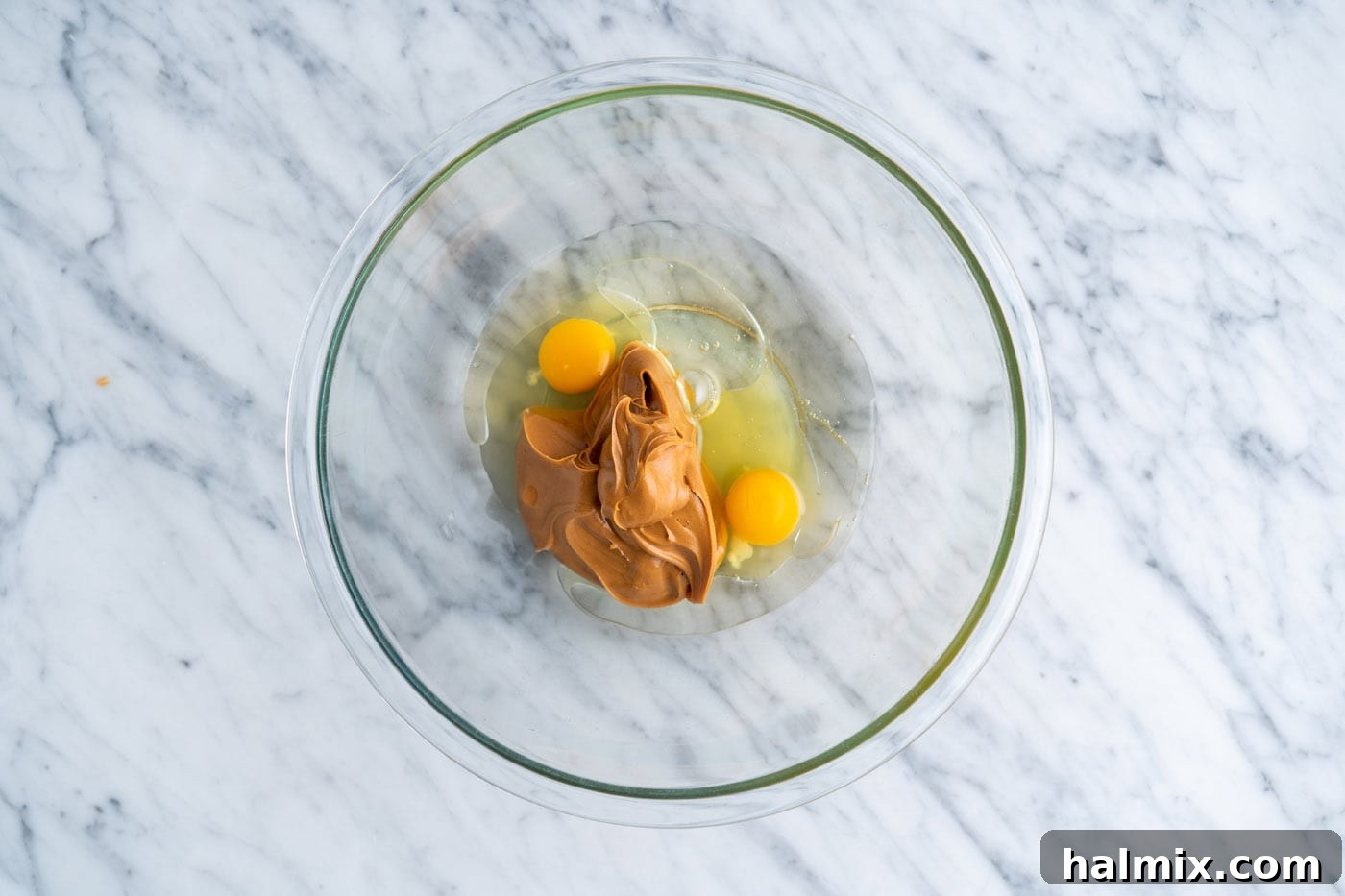 eggs, peanut butter, and oil in a bowl