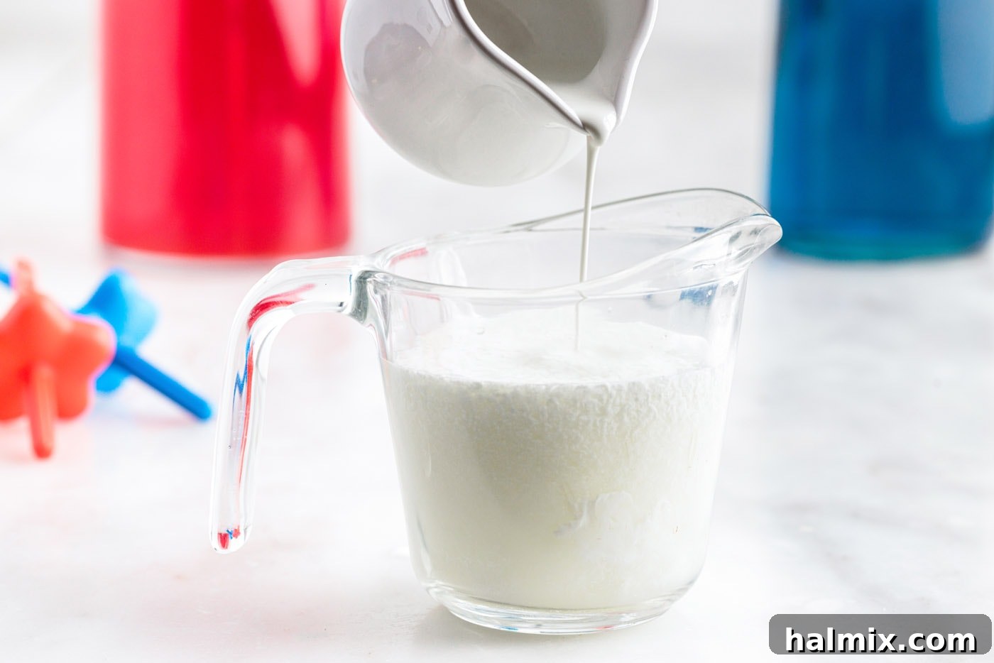pouring limeade into cream