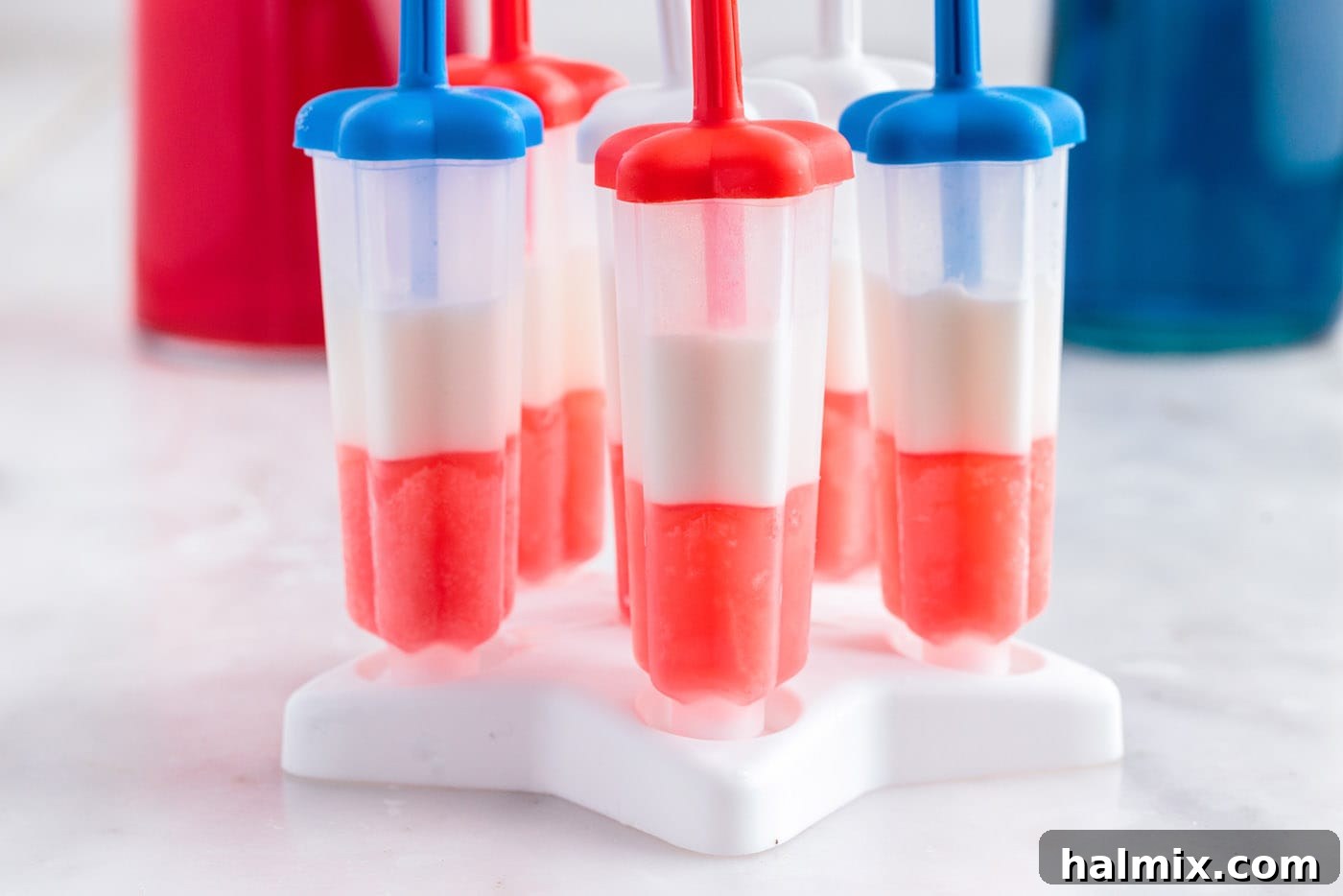 red and white layers for popsicles in a mold