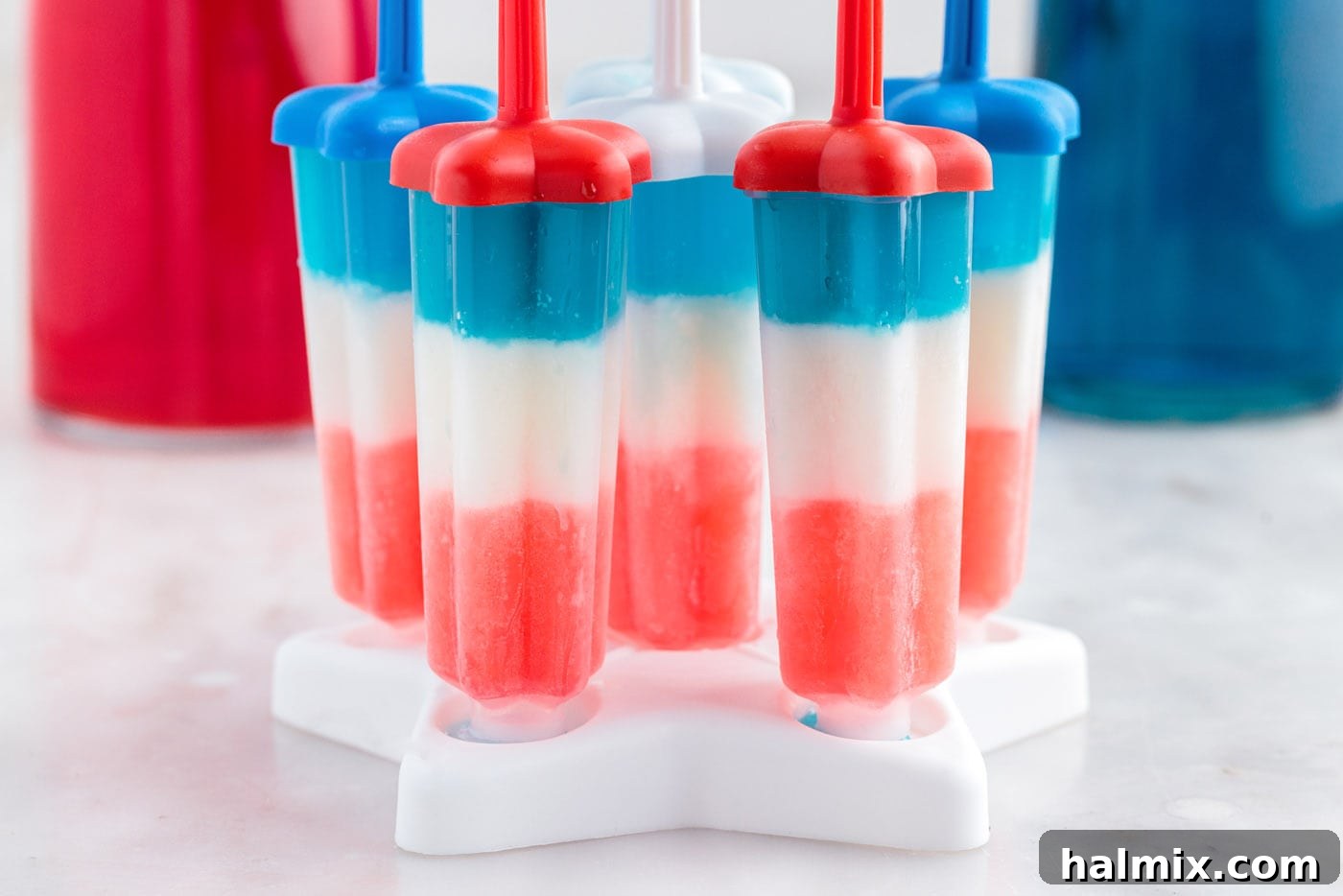 red white and blue popsicles in a mold