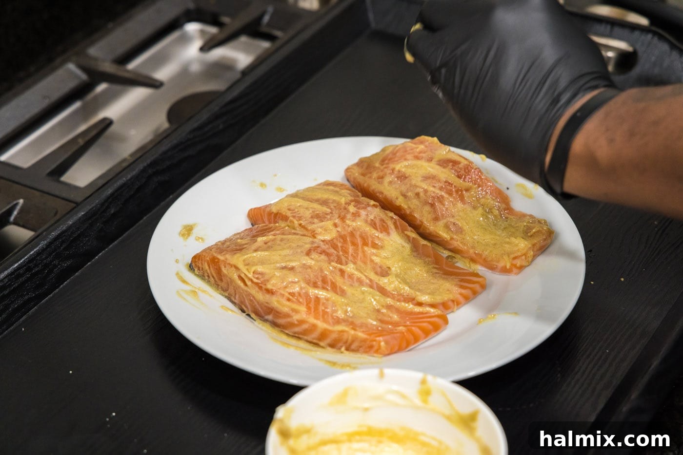 salmon filets with dijon brown sugar mixture on top