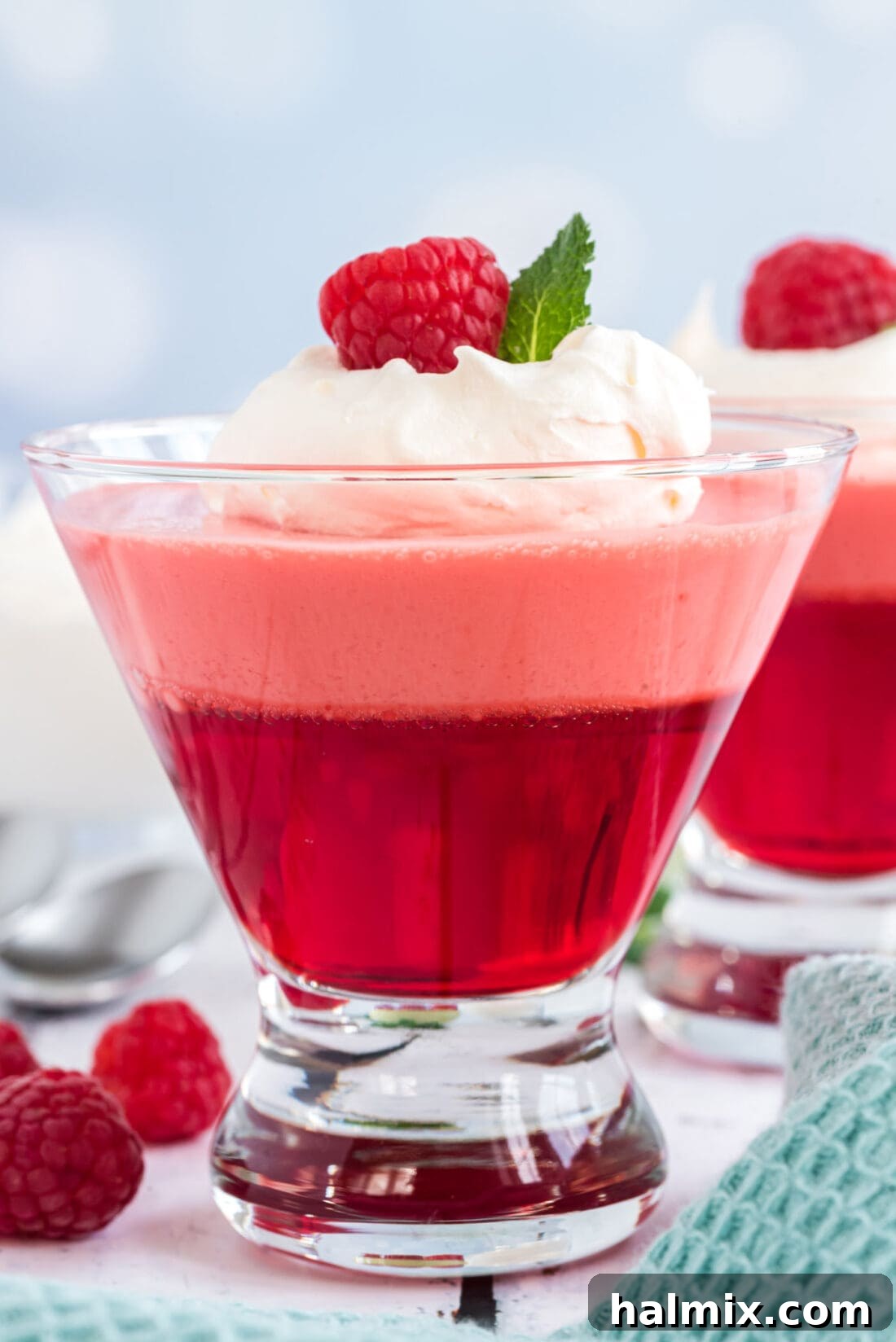 Ruby Raspberry Cream Stacks 3 One Raspberry Jell-O Parfait in a glass dessert dish, showing distinct layers