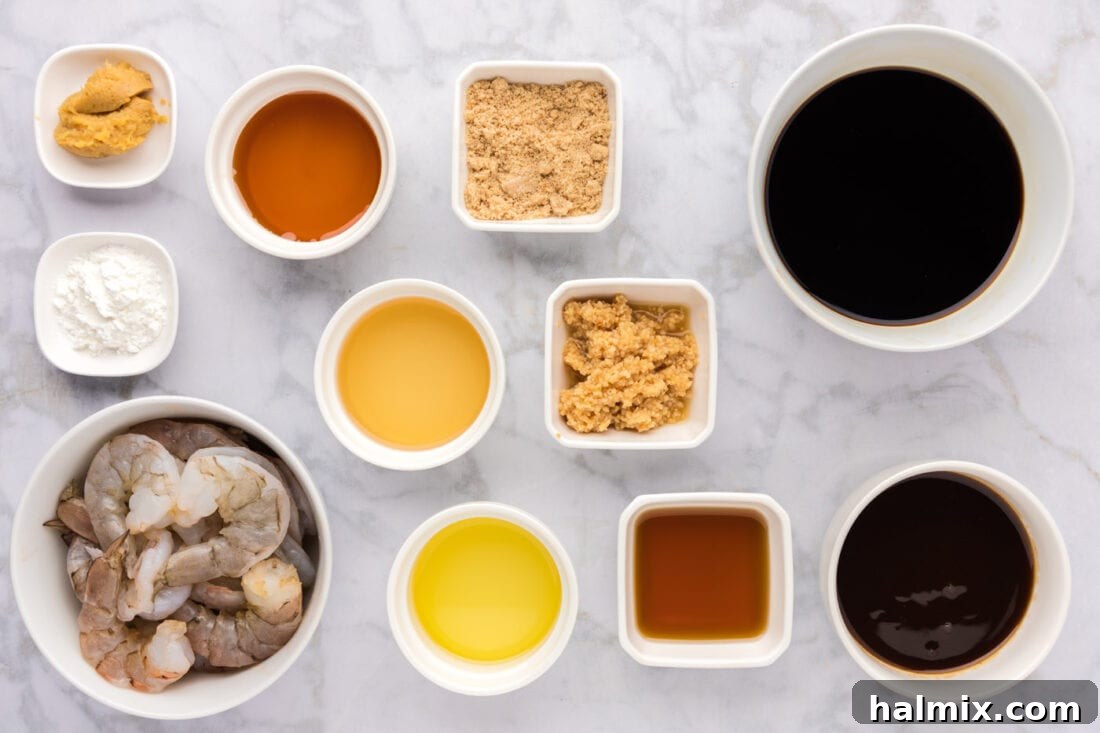 Sticky Teriyaki Shrimp 4 All the fresh ingredients laid out on a wooden cutting board for Teriyaki Shrimp, including shrimp, sauce components, and oil.