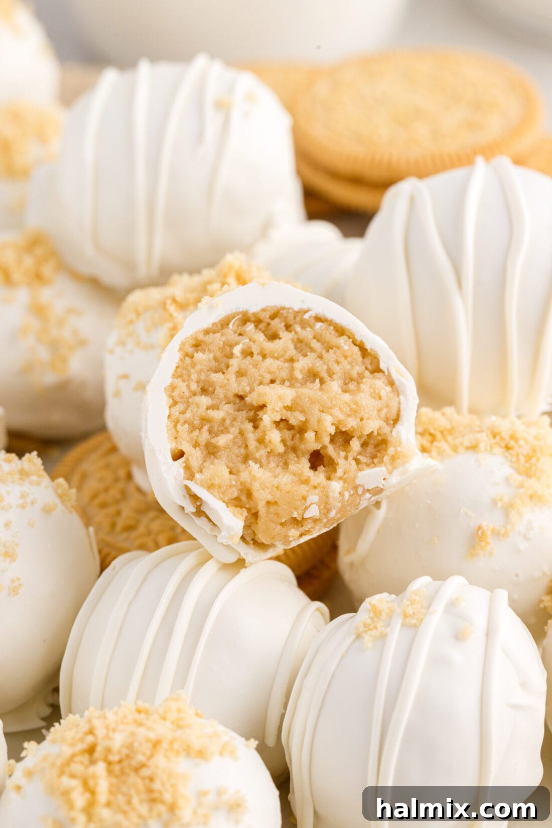 Close up photo of a Golden Oreo Truffle with a bite taken out