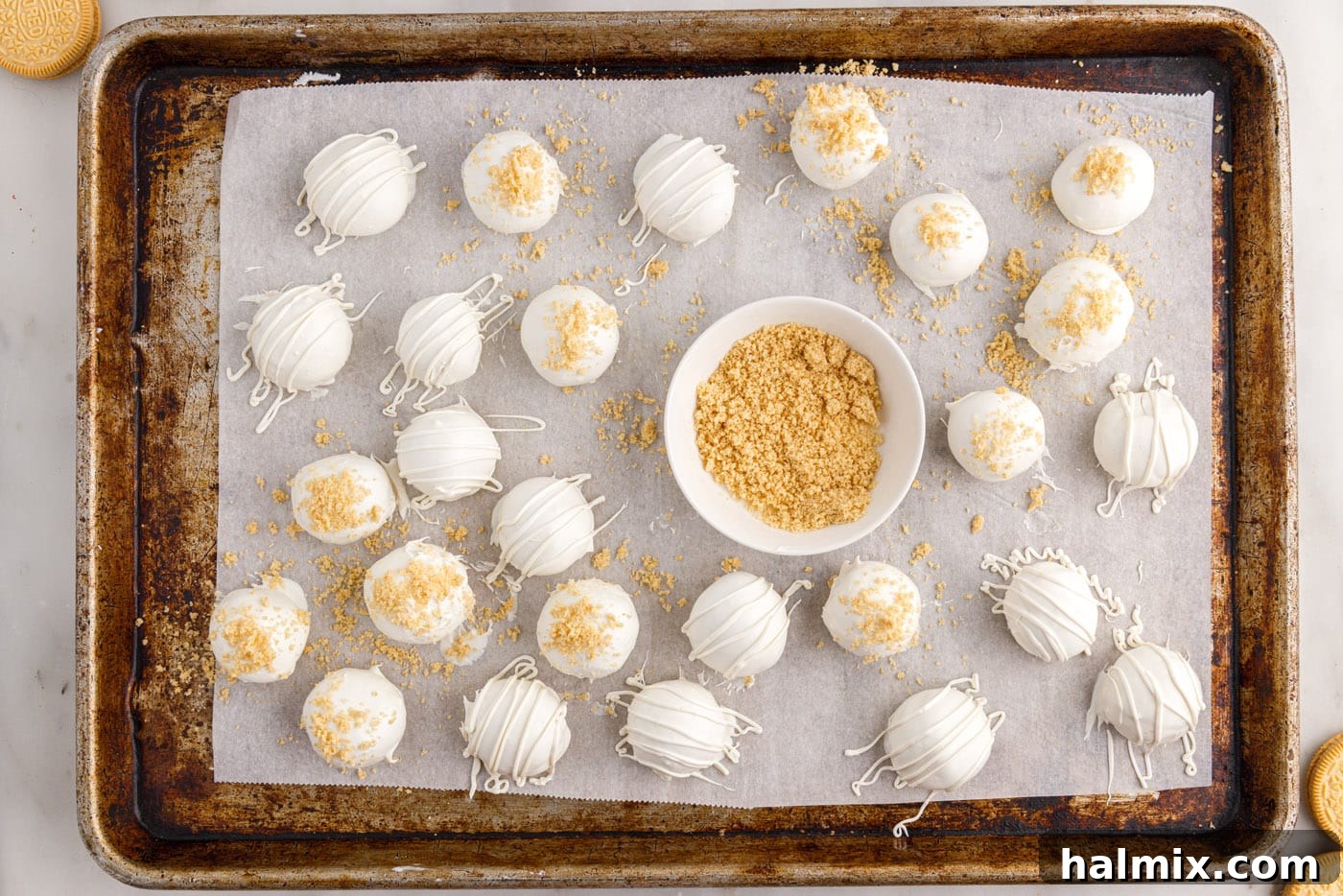 Oreo cookie crumbs sprinkled on top of Oreo balls