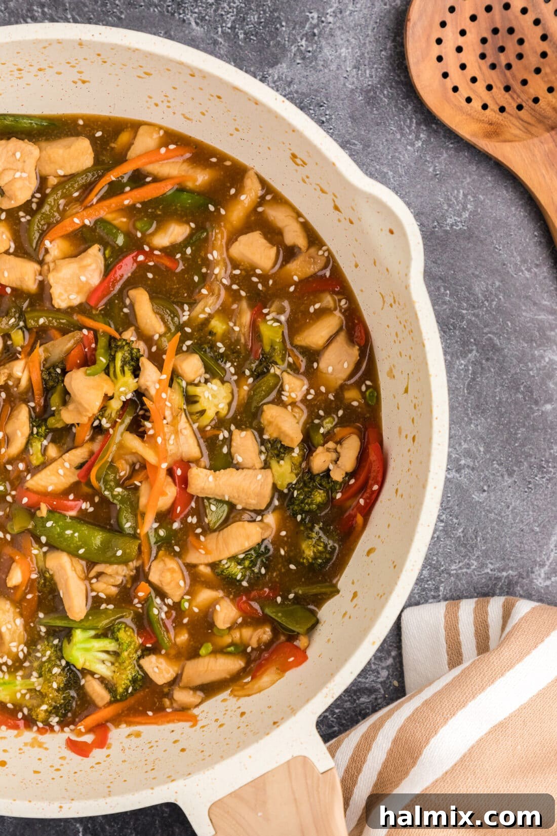 Photo of half of a skillet of Honey Garlic Chicken Stir Fry