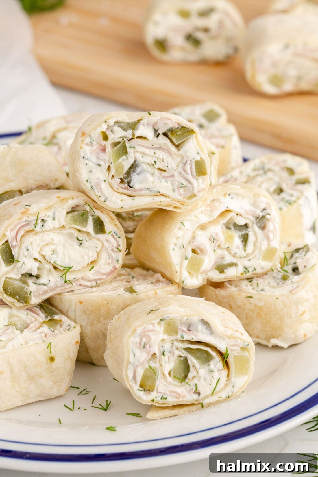 Dill Pickle Pinwheels stacked on a plate