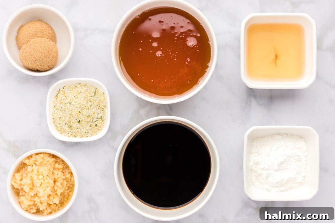 Sticky Sweet Honey Garlic Chicken Marinade 4 A collection of ingredients laid out for making Honey Garlic Chicken Marinade, including honey, soy sauce, garlic, and vinegar