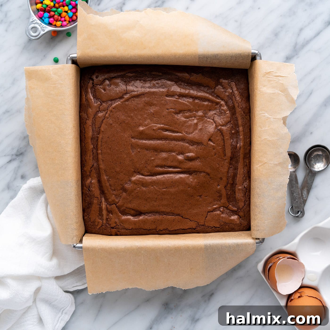 finished brownies in a baking dish, perfectly baked with a crackled top