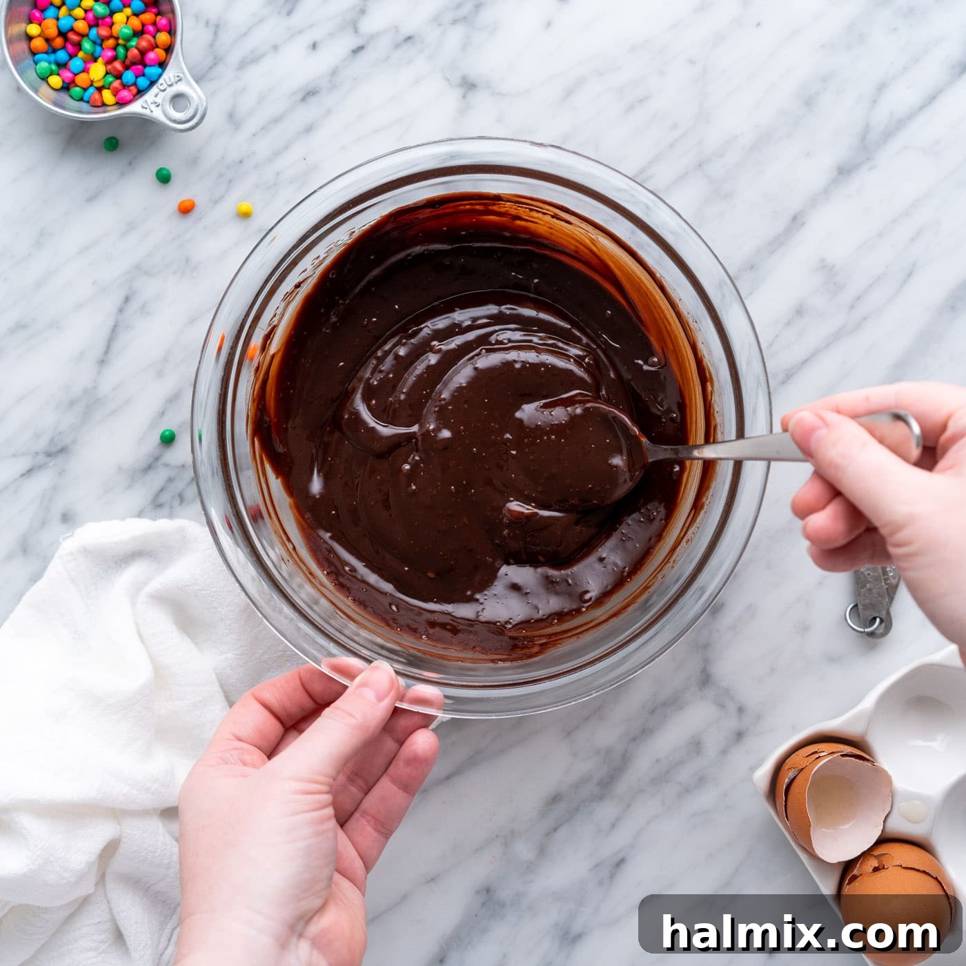 silky smooth ganache topping in a bowl, ready to be spread