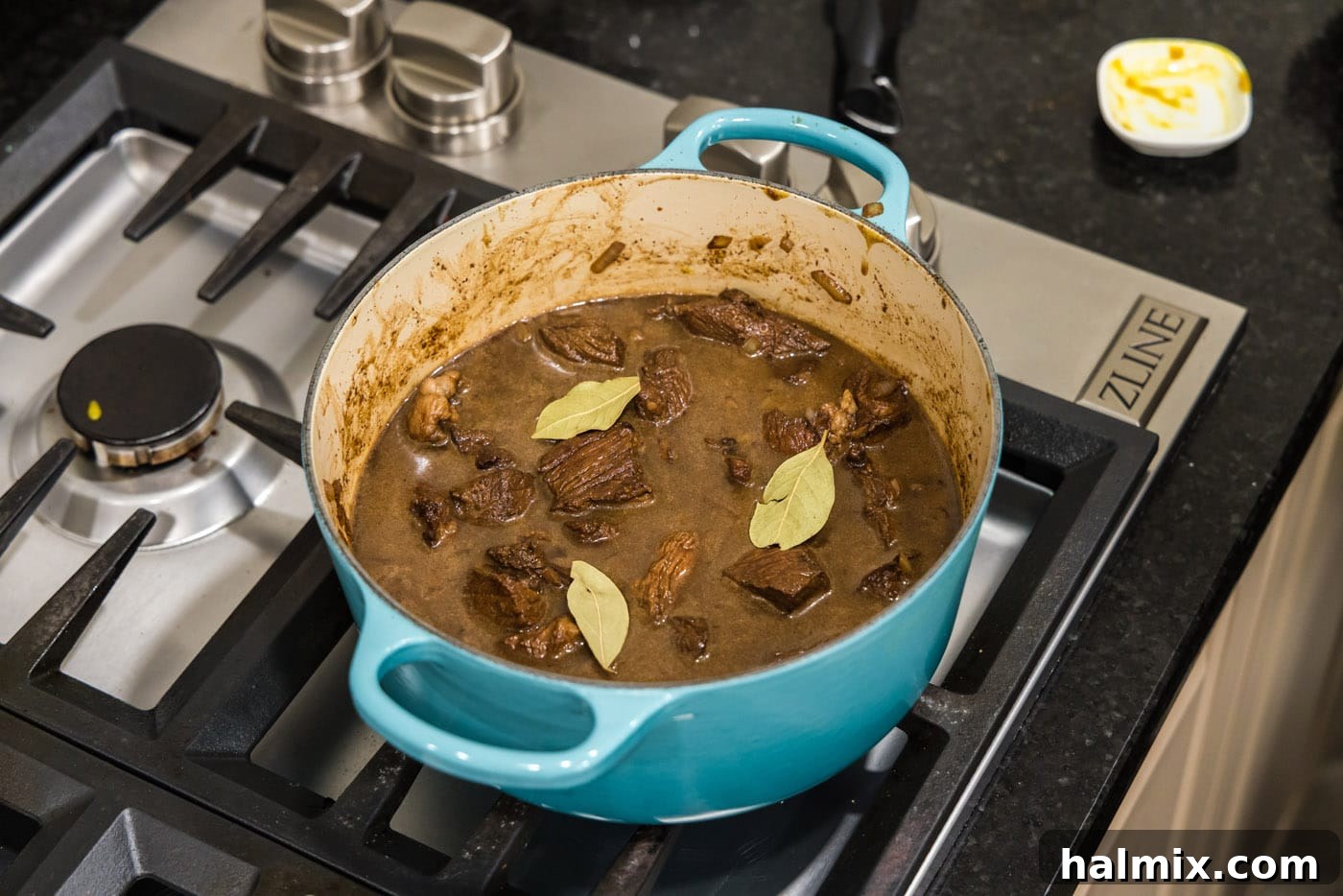 Savory Beef Bites in Velvety Gravy 12 beef tips and gravy simmering on the stovetop