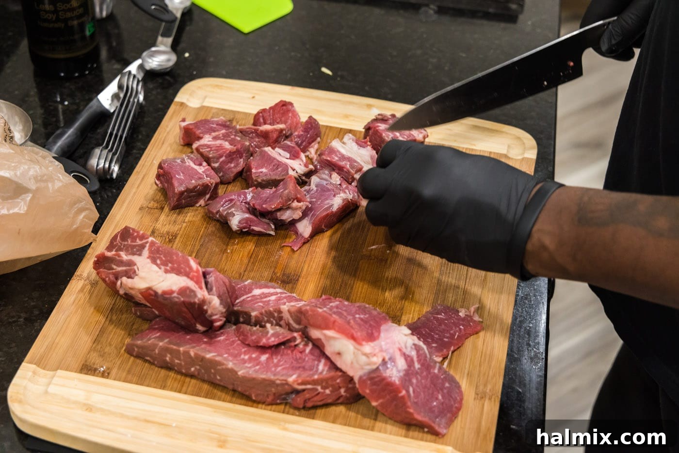 Savory Beef Bites in Velvety Gravy 5 slicing chuck roast into cubes