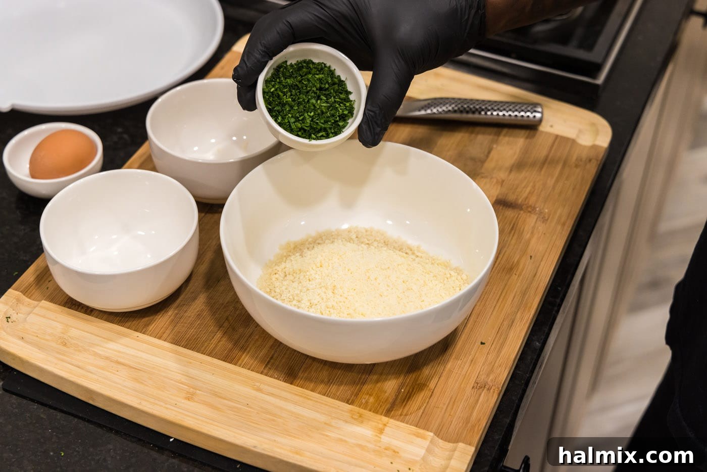 Crispy Wonton Cheese Bites 5 breadcrumbs, parsley, and parmesan cheese in a bowl