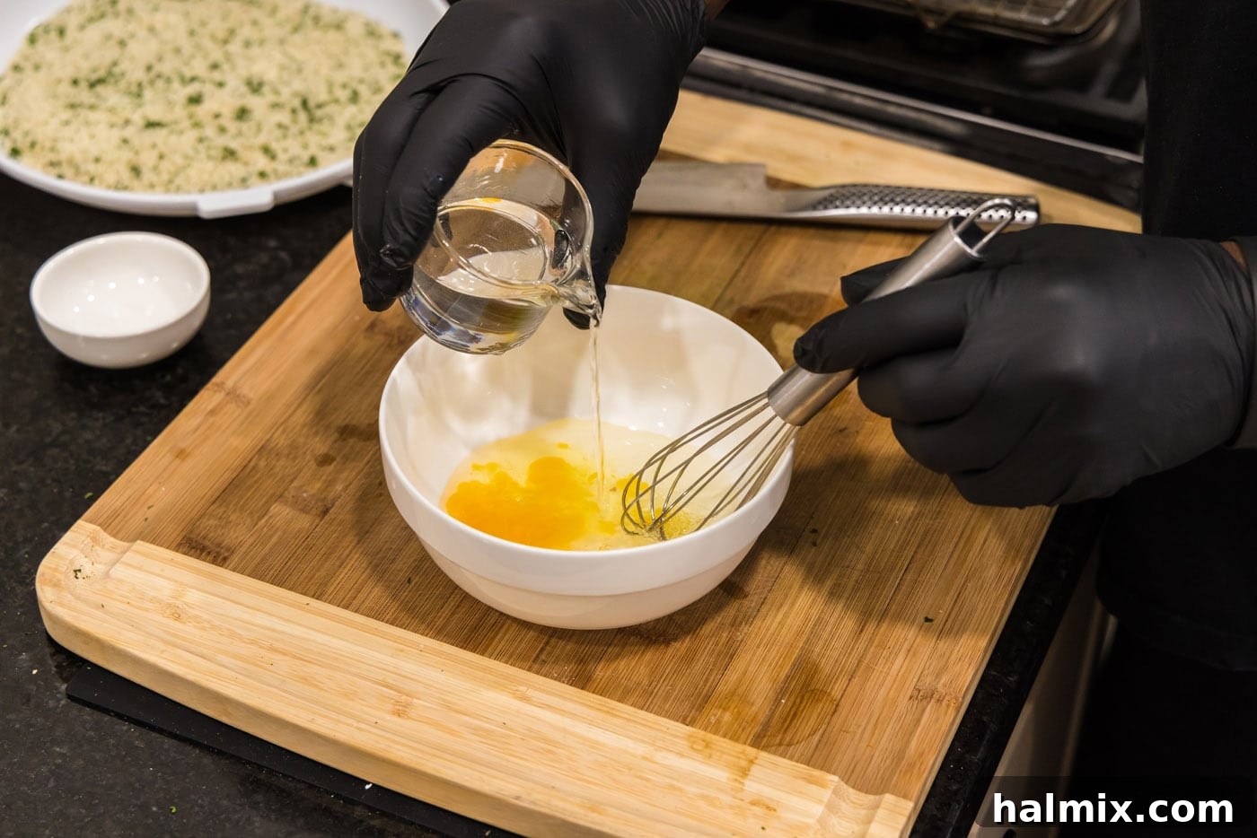 Crispy Wonton Cheese Bites 6 whisking egg with water
