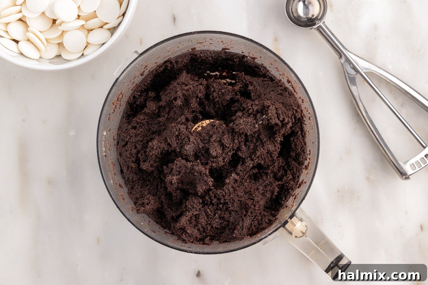 blitzed oreos and cream cheese mixture, forming a dough in the food processor