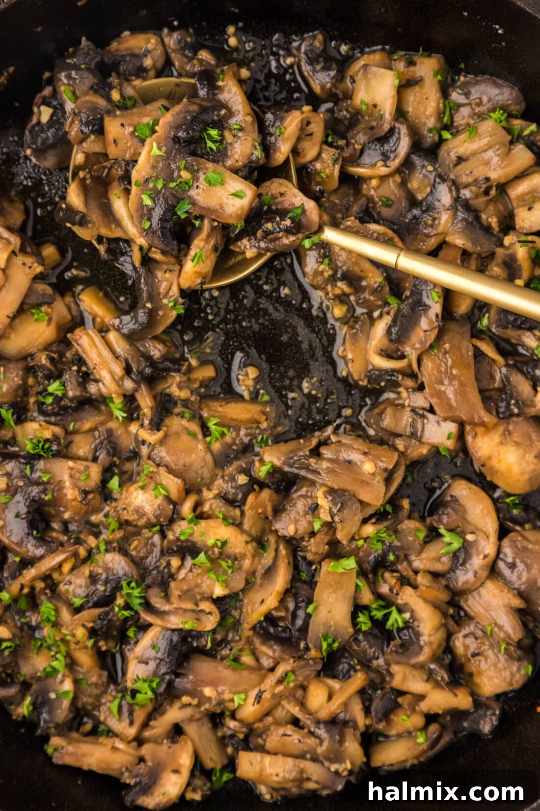Close-up shot of perfectly Sauteed Mushrooms, showcasing their delicious golden-brown texture.