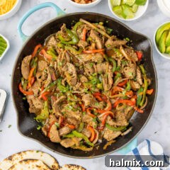 Steak Fajitas in a cast iron skillet