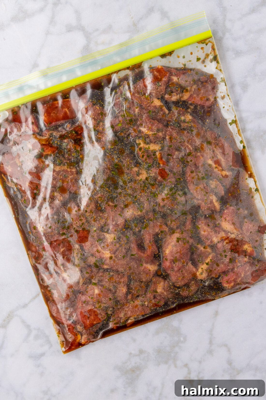 Fajita Marinade in a zip top bag, showcasing the rich color and texture