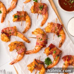 Close up photo of Bacon Wrapped Shrimp on a serving platter