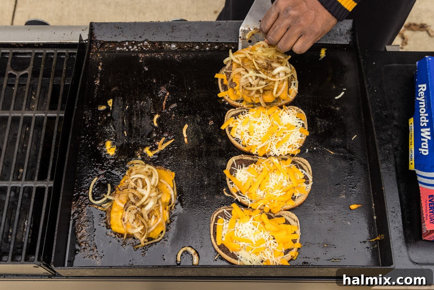 adding onions to patty melt