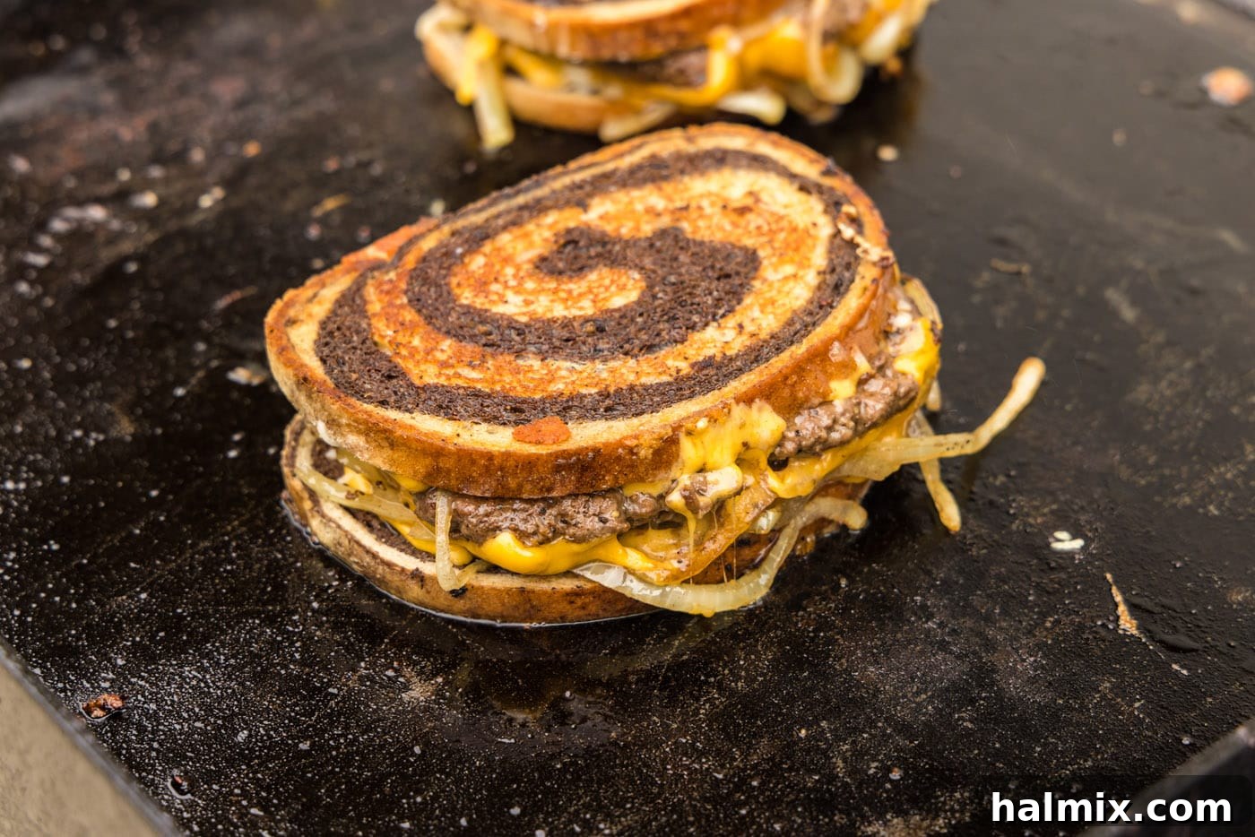 patty melt sandwich on the griddle