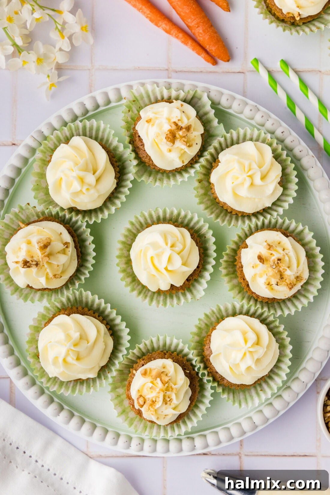 Decadent Carrot Cupcakes 3 Carrot Cupcakes on a white serving platter