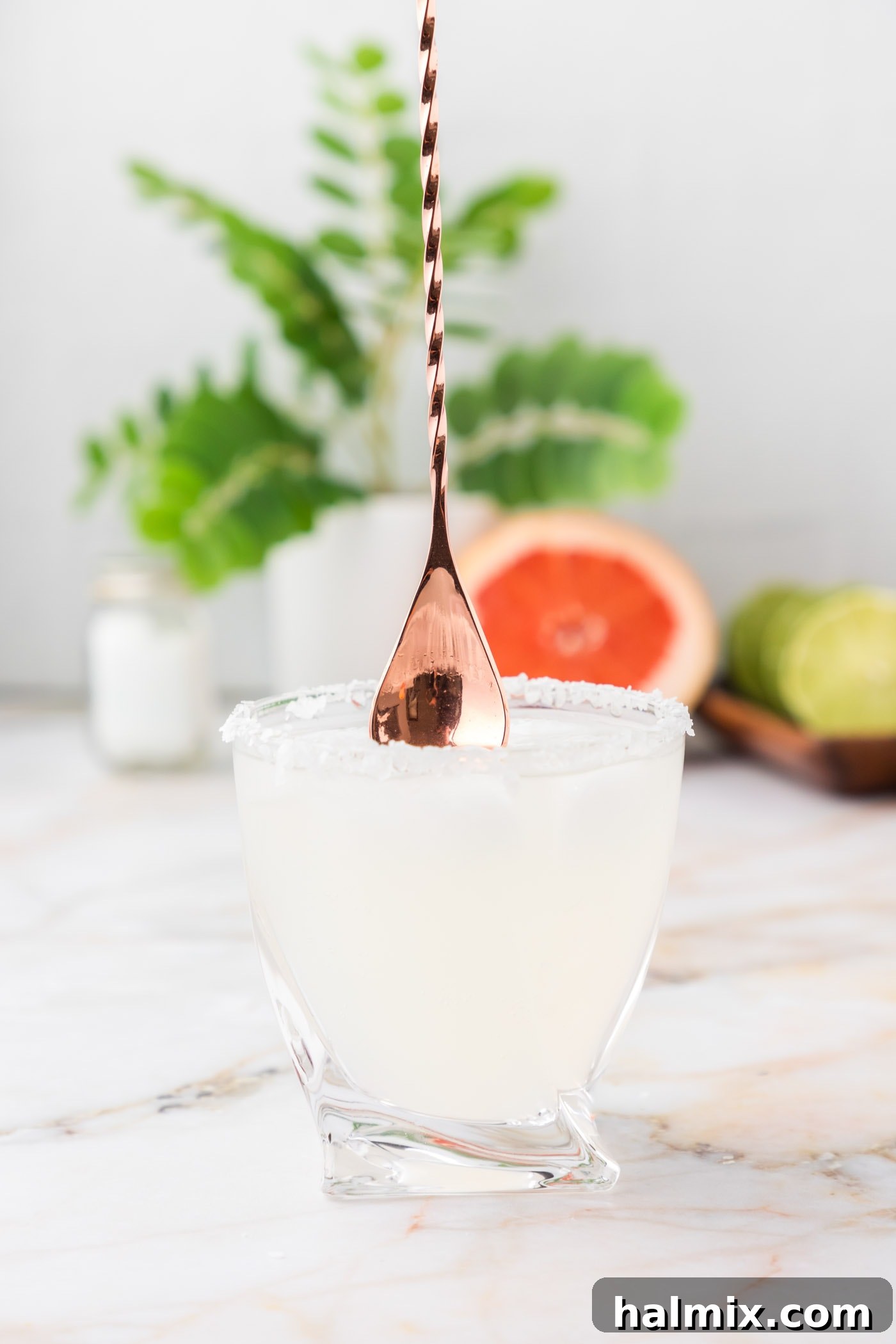 cocktail spoon stirring paloma drink