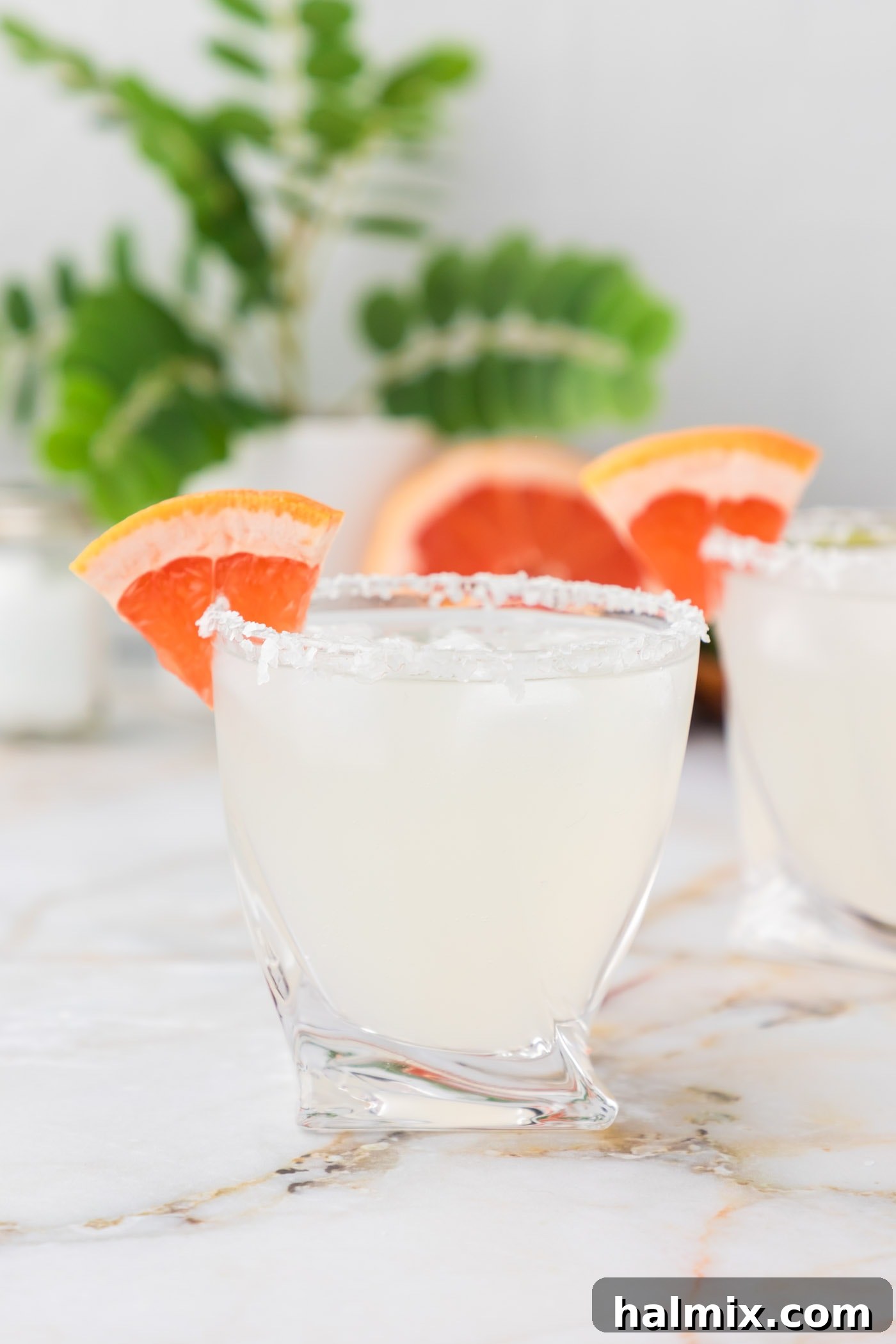 paloma cocktail garnished with grapefruit wedge