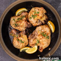 Garlic Butter Pork Chops in a skillet