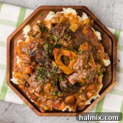 Braised Beef Shanks plated over mashed potatoes