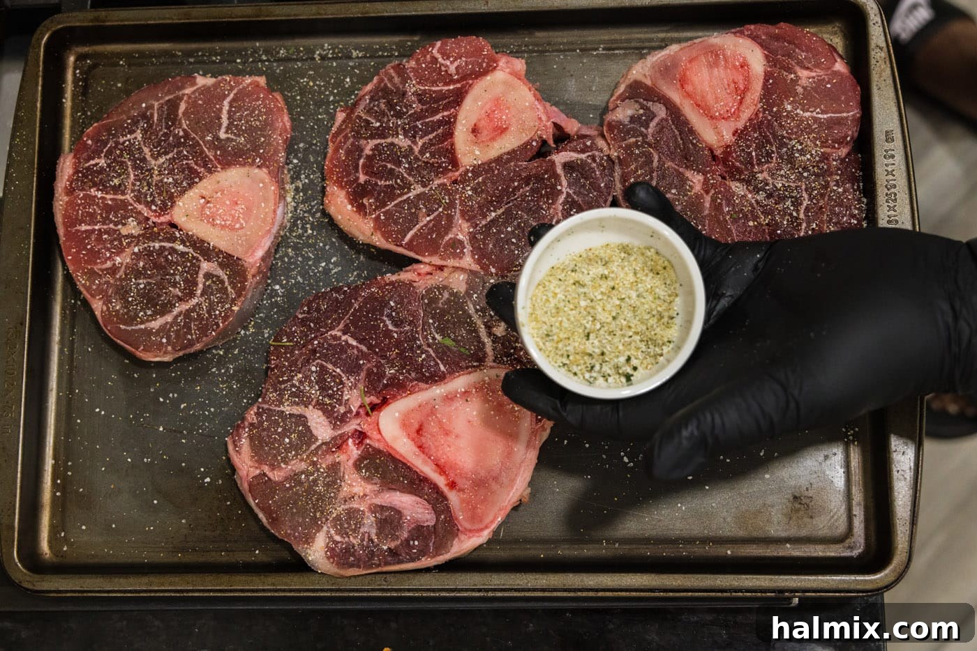 Seasoning beef shanks with garlic salt