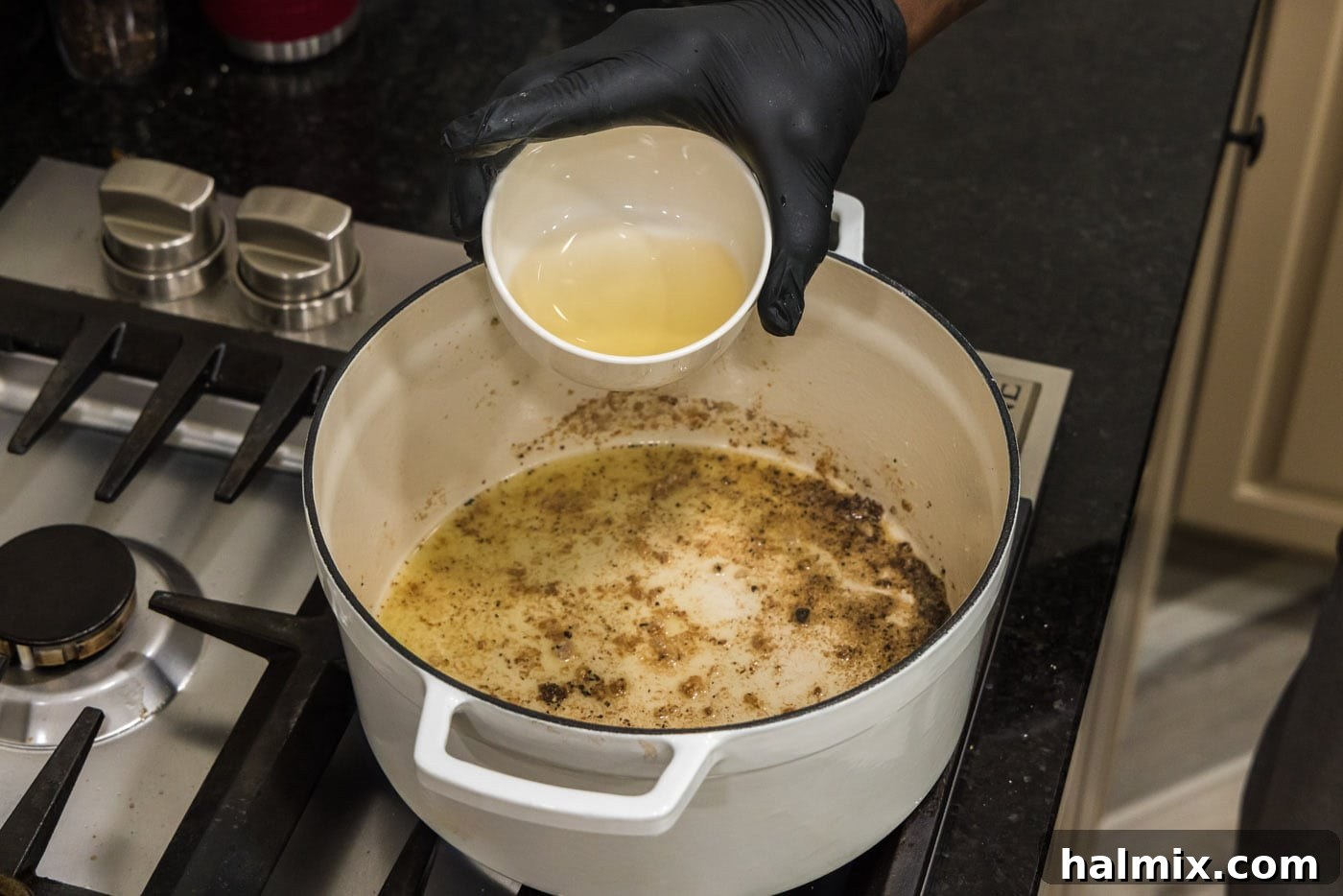 Adding white wine to deglaze the pan after searing beef