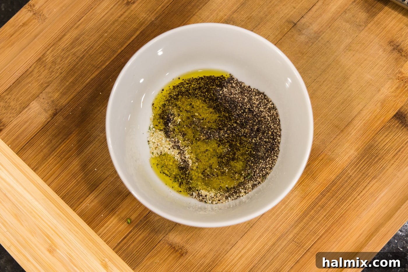 olive oil, garlic salt, and pepper in a bowl