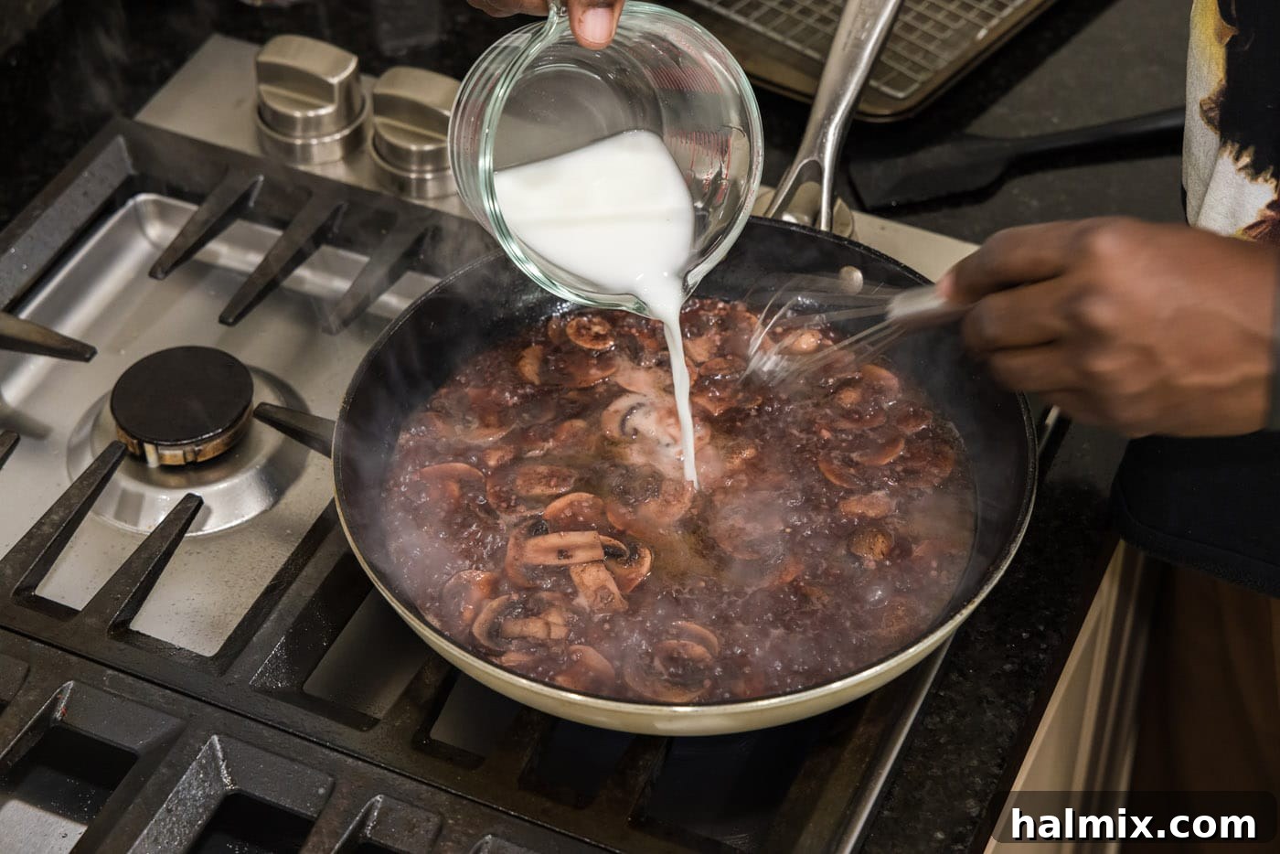 Marsala Veal: Italian Elegance 13 A cornstarch slurry being gently poured into the simmering mushroom Marsala sauce to thicken it